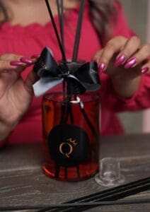 diffuser with ribbon around it