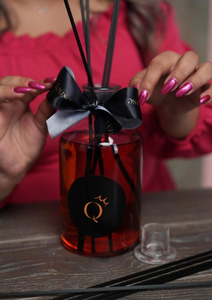 diffuser with ribbon around it