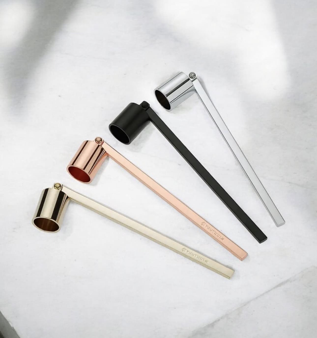 Candle wick snuffer